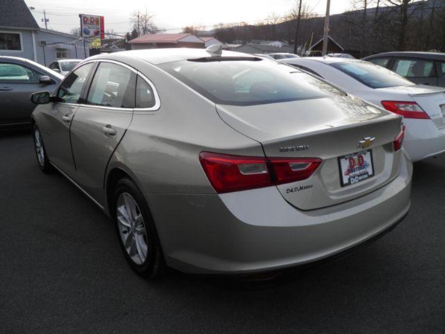 2016 TAN Chevrolet Malibu 1LT (1G1ZE5ST2GF) with an 1.5L L4 engine, AT transmission, located at 15520 McMullen Hwy SW, Belair, MD, 21502, (301) 729-3700, 39.581375, -78.846451 - Photo#4