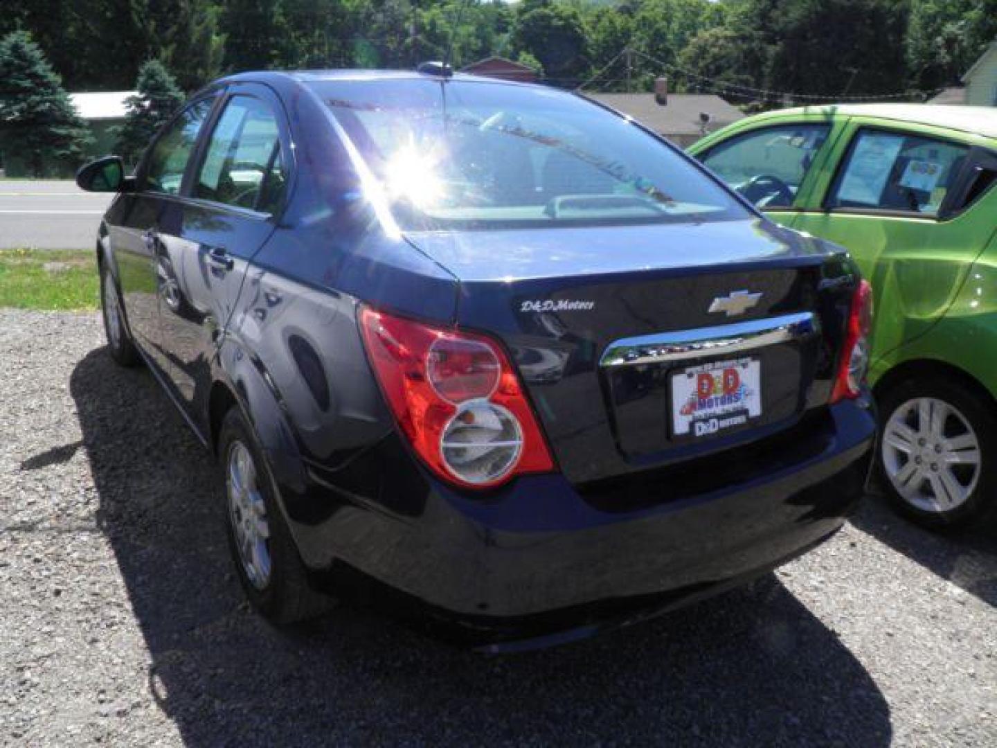 2016 BLUE Chevrolet Sonic LT Auto Sedan (1G1JC5SH8G4) with an 1.8L L4 engine, AT transmission, located at 19521 New George's Creek Rd SW, Barton, MD, 21521, (301) 463-2404, 39.524323, -79.017906 - Photo#4