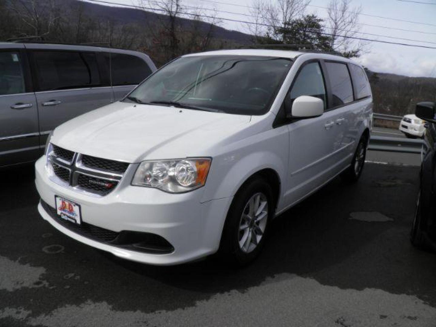 2016 WHITE Dodge Grand Caravan SXT (2C4RDGCGXGR) with an 3.6L V6 engine, AT transmission, located at 15520 McMullen Hwy SW, Belair, MD, 21502, (301) 729-3700, 39.581375, -78.846451 - Photo#0