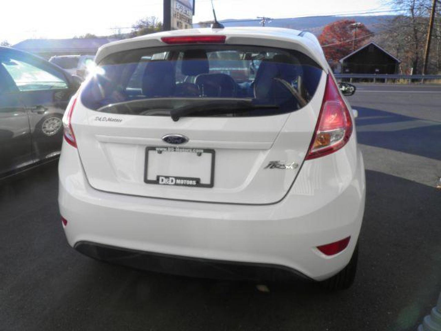 2016 WHITE Ford Fiesta S Hatchback (3FADP4TJ1GM) with an 1.6l L4 engine, AT transmission, located at 15520 McMullen Hwy SW, Belair, MD, 21502, (301) 729-3700, 39.581375, -78.846451 - Photo#4