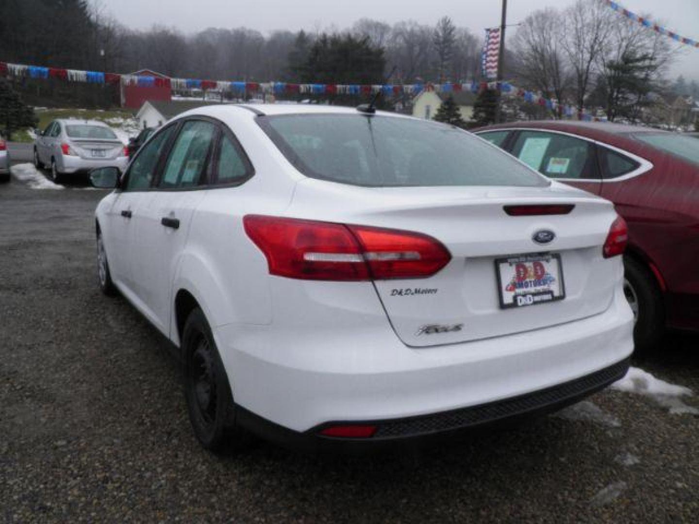 2016 WHITE Ford Focus S Sedan (1FADP3E24GL) with an 2.0L L4 engine, AT transmission, located at 19521 New George's Creek Rd SW, Barton, MD, 21521, (301) 463-2404, 39.524323, -79.017906 - Photo#4