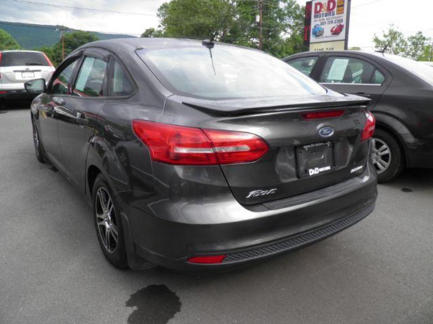 2016 GRAY FORD FOCUS S Sedan (1FADP3E24GL) with an 2.0L L4 DOHC 16V engine, AT transmission, located at 15520 McMullen Hwy SW, Belair, MD, 21502, (301) 729-3700, 39.581375, -78.846451 - Photo#4