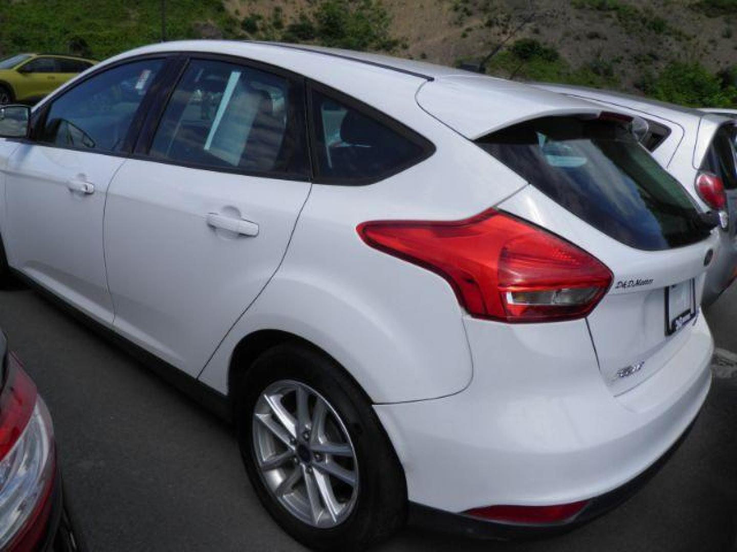 2016 WHITE FORD FOCUS SE Hatch (1FADP3K25GL) with an 2.0L L4 engine, AT transmission, located at 19521 New George's Creek Rd SW, Barton, MD, 21521, (301) 463-2404, 39.524323, -79.017906 - Photo#5