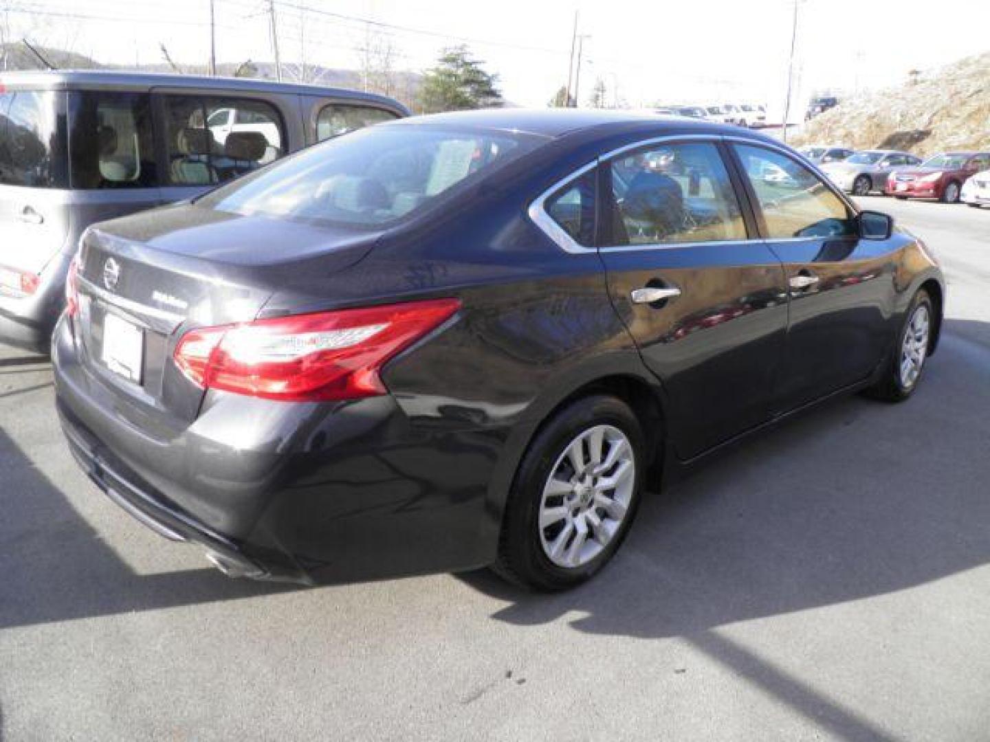 2016 BLACK Nissan Altima 2.5 S (1N4AL3APXGN) with an 2.5 L4 engine, AT transmission, located at 19521 New George's Creek Rd SW, Barton, MD, 21521, (301) 463-2404, 39.524323, -79.017906 - Photo#3