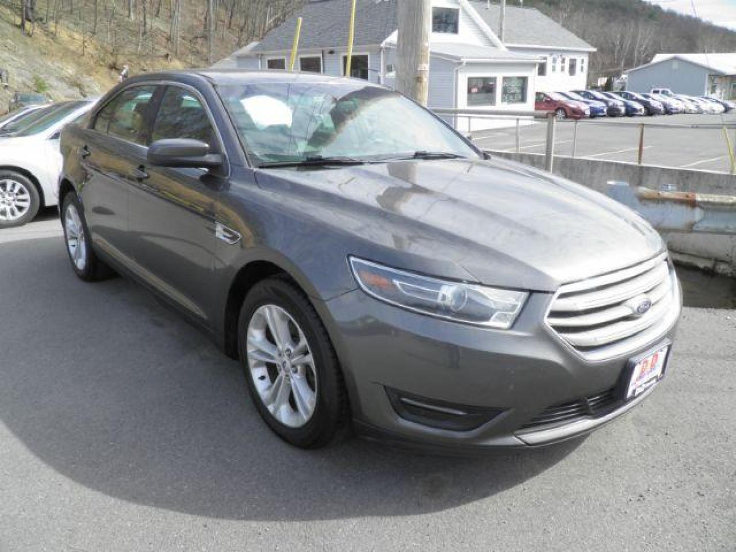 2017 GRAY Ford Taurus SEL AWD (1FAHP2H86HG) with an 3.5L V6 engine, AT transmission, located at 15520 McMullen Hwy SW, Belair, MD, 21502, (301) 729-3700, 39.581375, -78.846451 - Photo#0