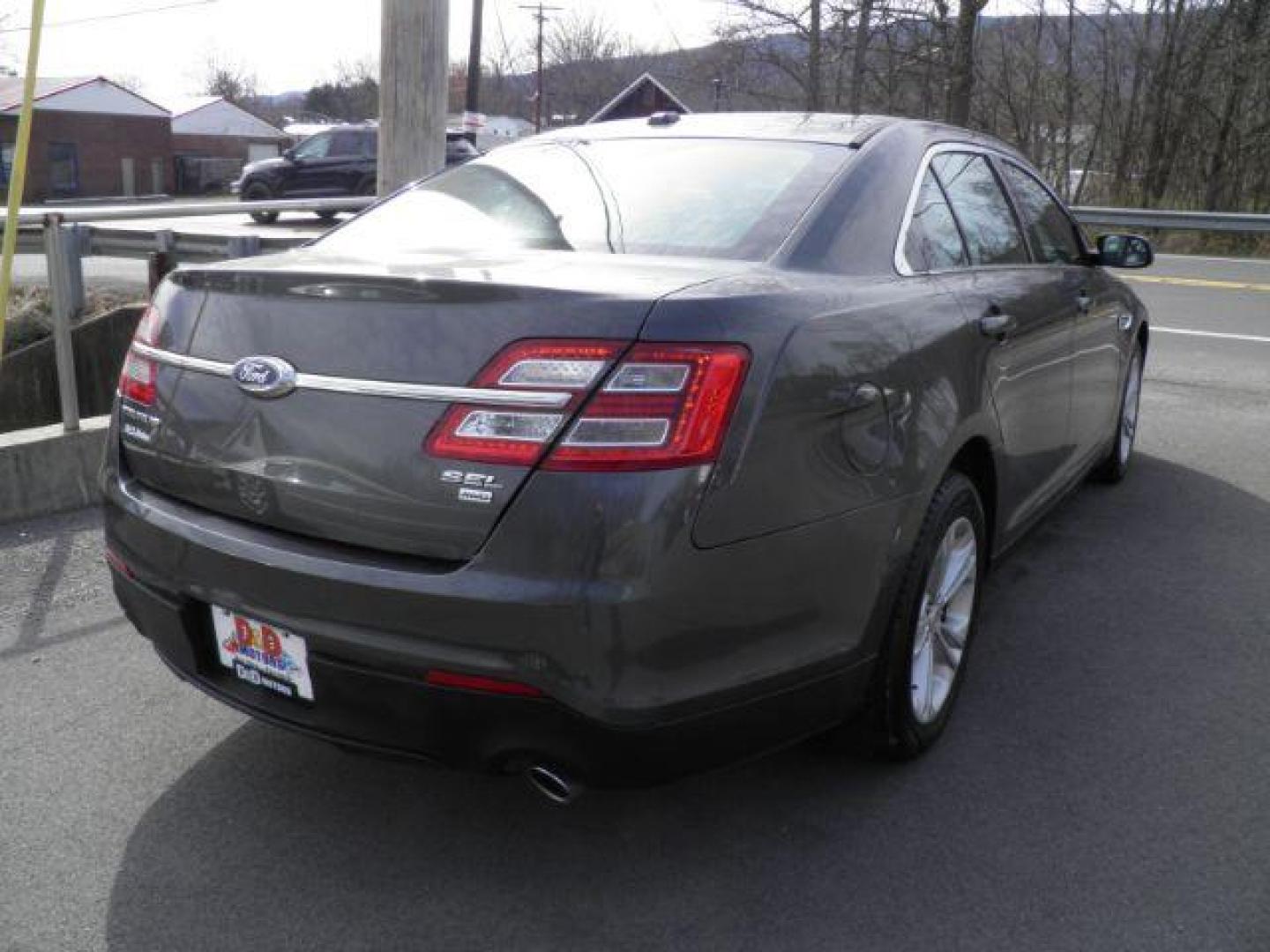 2017 GRAY Ford Taurus SEL AWD (1FAHP2H86HG) with an 3.5L V6 engine, AT transmission, located at 15520 McMullen Hwy SW, Belair, MD, 21502, (301) 729-3700, 39.581375, -78.846451 - Photo#3