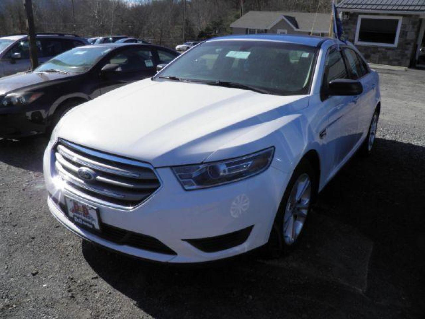 2017 WHITE Ford Taurus SE FWD (1FAHP2D85HG) with an 3.5L V6 engine, AT transmission, located at 19521 New George's Creek Rd SW, Barton, MD, 21521, (301) 463-2404, 39.524323, -79.017906 - Photo#0