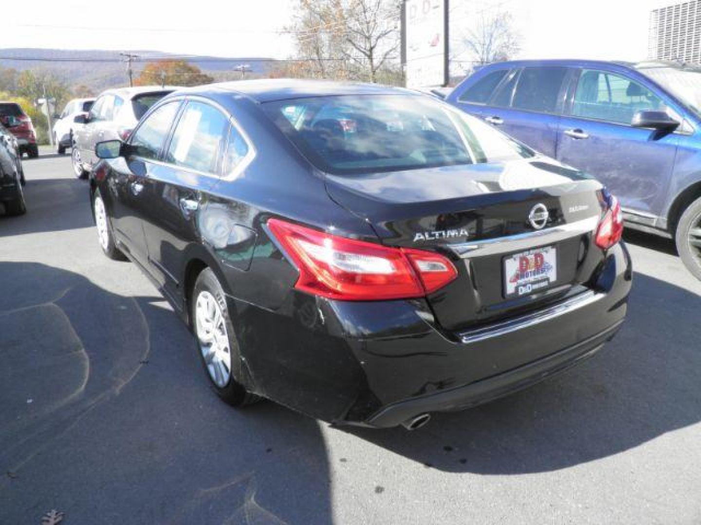 2017 BLACK Nissan Altima 2.5 (1N4AL3AP0HC) with an 2.5L L4 DOHC 16V engine, AT transmission, located at 19521 New George's Creek Rd SW, Barton, MD, 21521, (301) 463-2404, 39.524323, -79.017906 - Photo#4