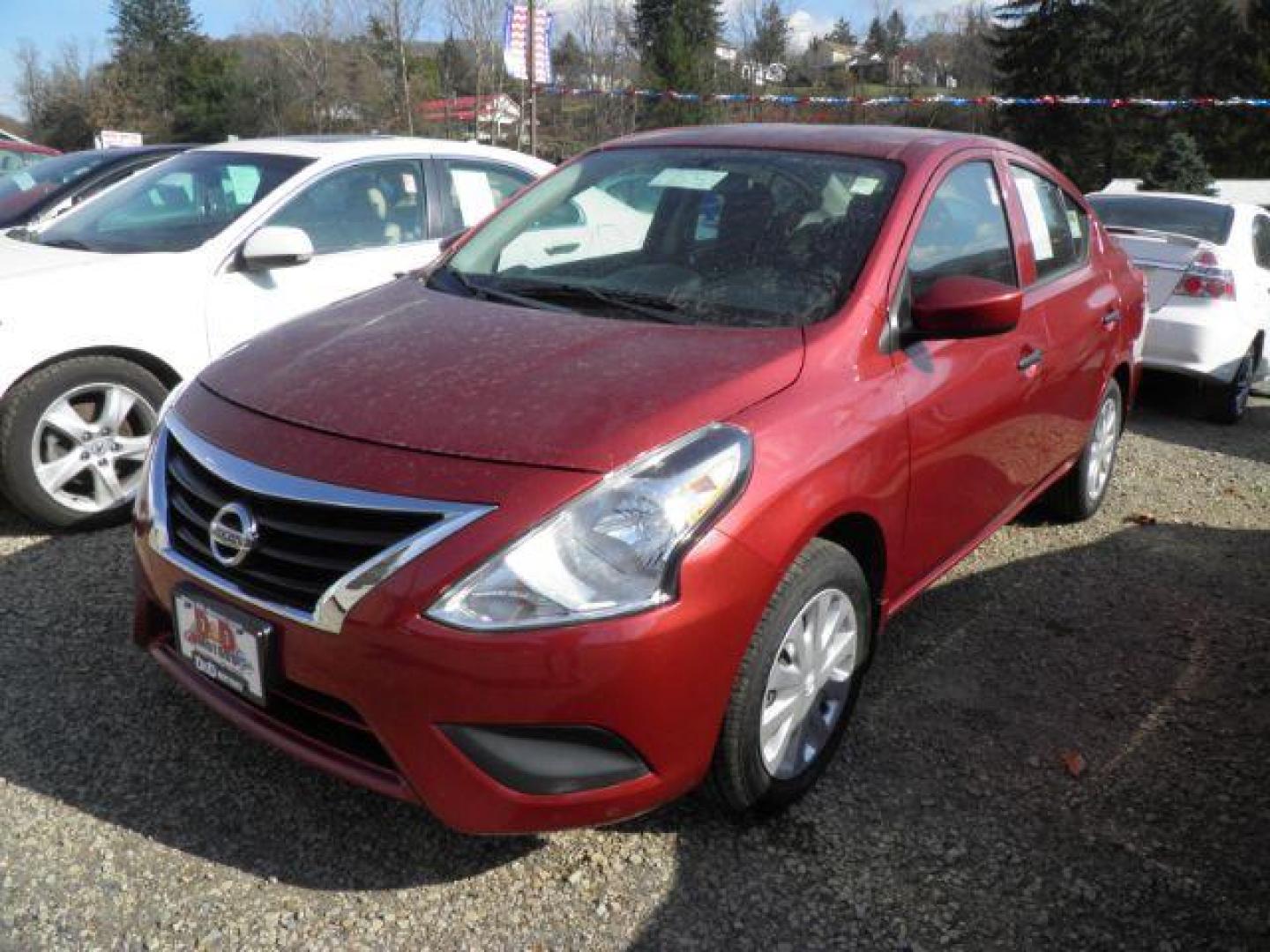 2017 RED NISSAN VERSA 1.6 S 4A (3N1CN7APXHL) with an 1.6L L4 engine, AT transmission, located at 15520 McMullen Hwy SW, Belair, MD, 21502, (301) 729-3700, 39.581375, -78.846451 - Photo#0