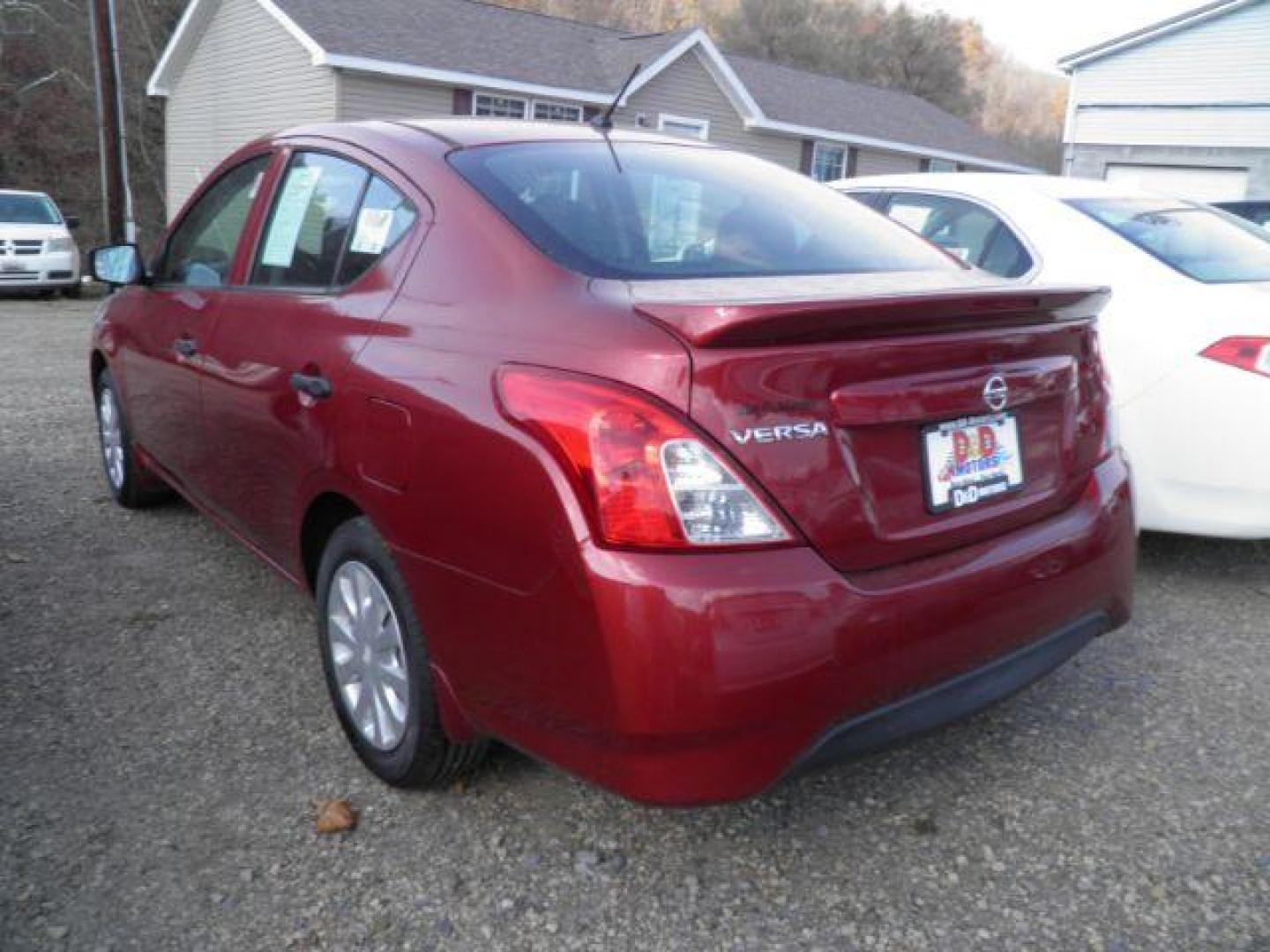 2017 RED NISSAN VERSA 1.6 S 4A (3N1CN7APXHL) with an 1.6L L4 engine, AT transmission, located at 15520 McMullen Hwy SW, Belair, MD, 21502, (301) 729-3700, 39.581375, -78.846451 - Photo#4