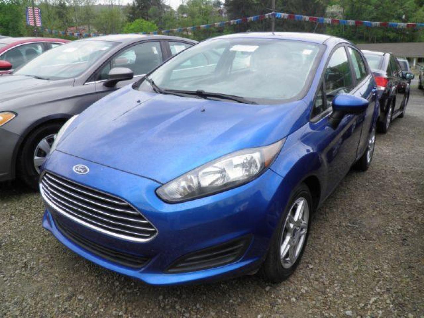 2019 BLUE Ford Fiesta SE Hatchback (3FADP4EJ0KM) with an 1.6L L4 engine, AT transmission, located at 19521 New George's Creek Rd SW, Barton, MD, 21521, (301) 463-2404, 39.524323, -79.017906 - Photo#0